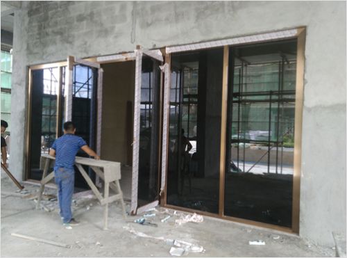 不銹鋼全玻璃地彈門